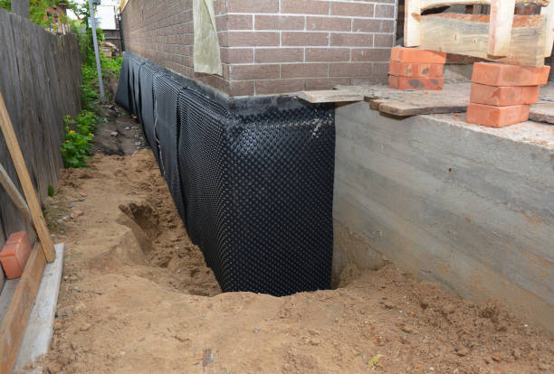 Happy homeowners after waterproofing job in Oostburg